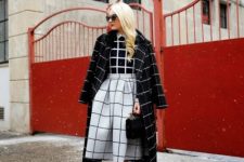 With checked shirt, checked midi coat and black pumps