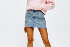 With denim mini skirt and light blue mid calf boots