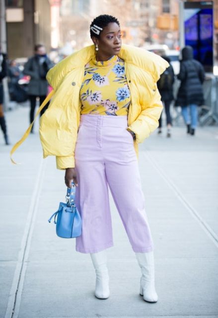 With floral shirt, lilac culottes, white high boots and light blue leather bag