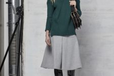 With gray midi skirt, black bag and black patent leather over the knee boots