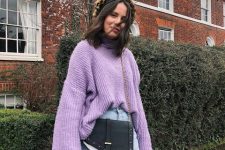 With lilac oversized sweater, black chain strap bag and high-waisted jeans