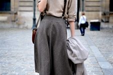 With loose shirt, printed skirt and gray coat