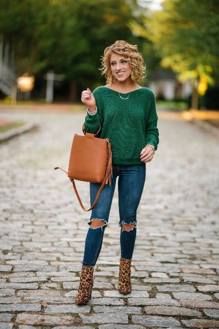 With skinny jeans, brown leather bag and leopard printed boots