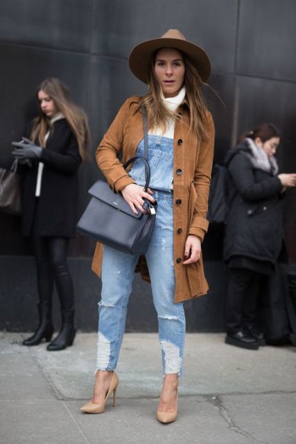 With white sweater, hat, leather bag, beige pumps and brown coat