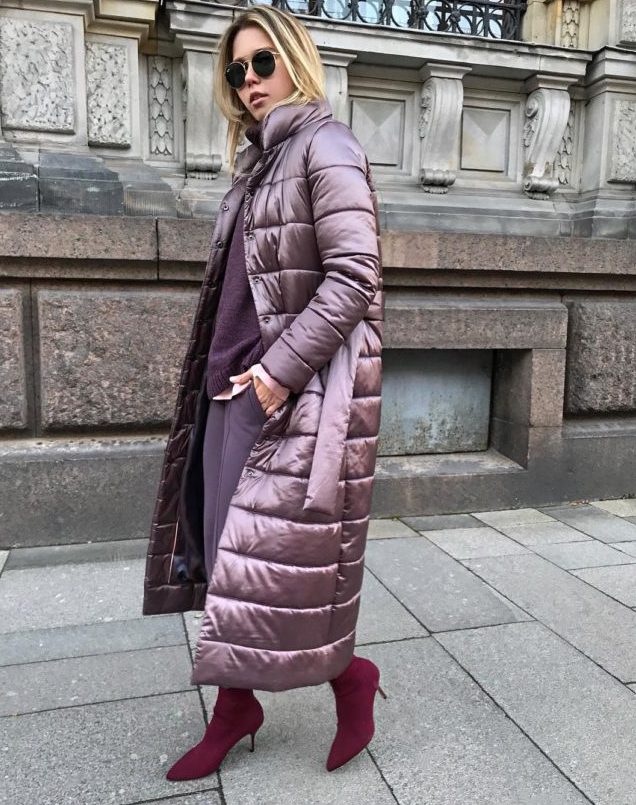 a beautiful berry hued look with a purple sweater, pants, plum colored sock booties and a purple puffer coat with a belt