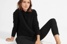 a black cashmere hoodie, black skinnies, white sneakers for a sporty and comfy everyday look