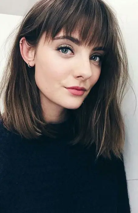 a dark messy long bob with light highlights and a fringe is a beautiful idea if you don't want any waves