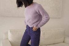 a pretty amd romantic outfit with navy jeans, a lavender sweater and matching lilac boots is a lovely touch of color