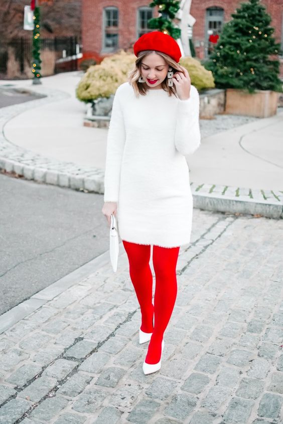 a retro look with a white sweater dress, red tights, white shoes, a red beret and statement earrings is cool