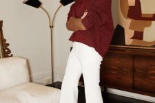 a tan turtleneck, an oversized burgundy sweater, white palazzo pants for a colorful and comfy look