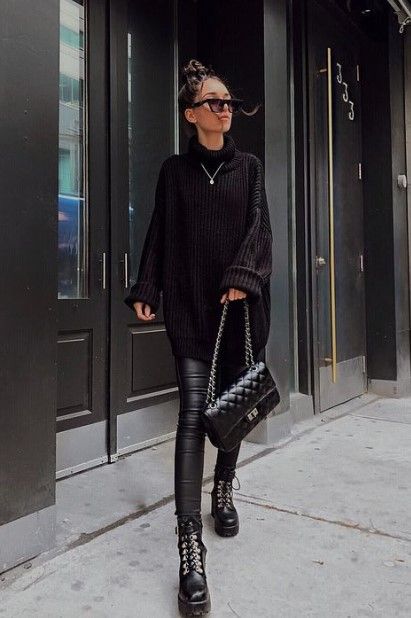 a total black outfit with leather leggings, boots, an oversized sweater, a bag is a timeless idea