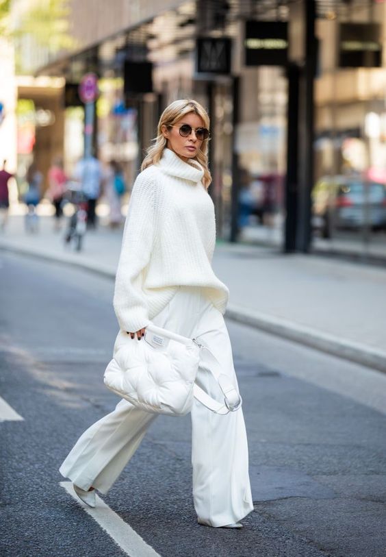 a trendy outfit with an oversized sweater, wideleg pants, shoes and a puff bag is super chic and bold