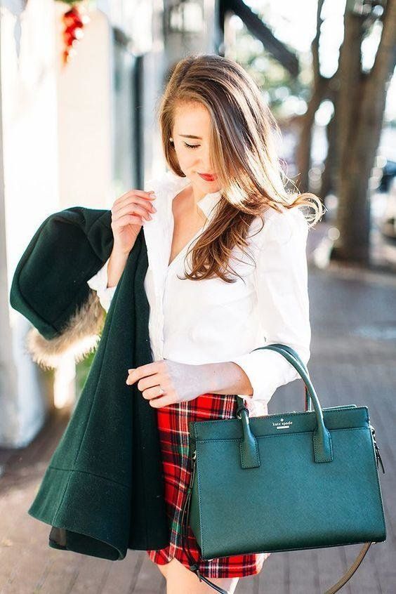 a white shirt, a red plad mini, a green bag and a green coat for a stylish and sexy Christmas outfit