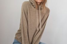 an oversized tan cashmere hoodie plus light blue jeans are always a win-win combo