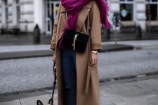 blue jeans, neutral trainers, a tan coat, a black bag and a bold fuchsia accent scarf to make a statement