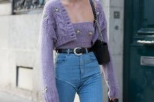 light blue jeans, a purple knit top and a matching cardigan, statement earrings and a black bag for a cute girlish look