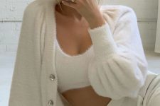 white high waisted pants, a white knit crop top and a matching cropped cardigan with puff sleeves for a beautiful look