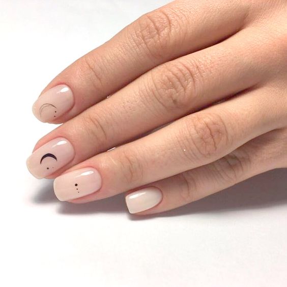 a very subtle celestal nail art on nude nails is a very cool and fresh idea to rock