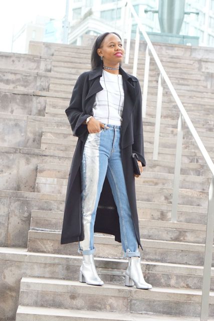 With checked shirt, silver and blue cuffed jeans, dark gray midi coat and clutch
