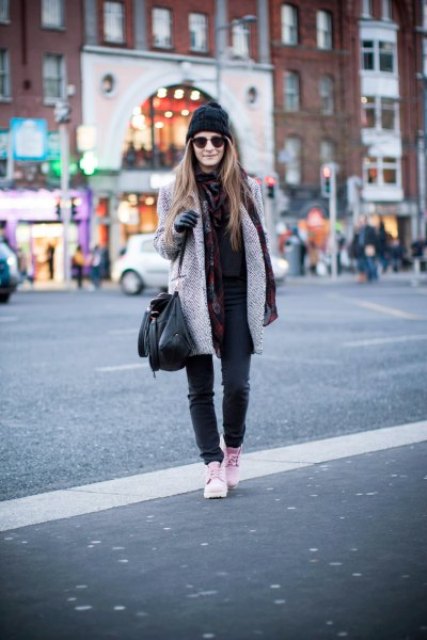 With jeans, black hat, coat, black bag and scarf