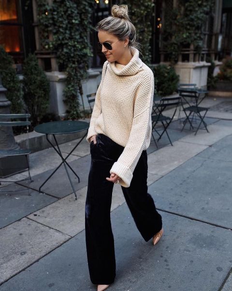With white loose sweater and beige pumps