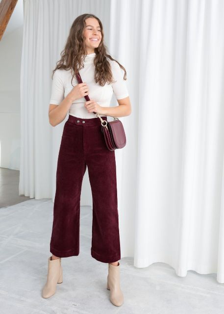 With white turtleneck, marsala crossbody bag and beige ankle boots