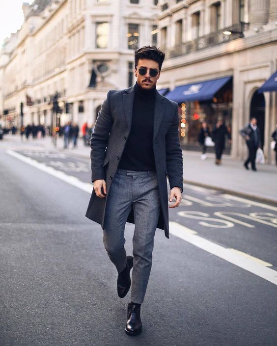 a black turtleneck, grey pants, a graphite grey coat and black shoes are classics of business casual