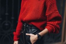 a black zipped leather mini, a red chunky knit turtleneck sweater are all you need for a statement holiday look