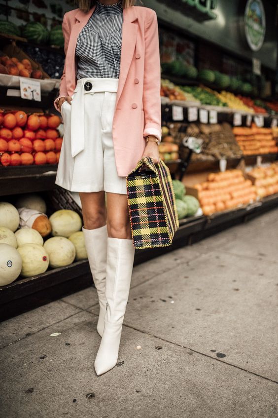 a printed turtleneck, creamy shorts and boots, a plaid bag and a pink oversized blazer for spring