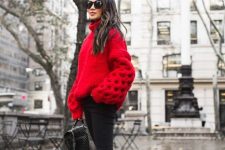 a red turtleneck sweater with oversized puff sleeves, black skinnies, white sneakers and a black bag for holidays