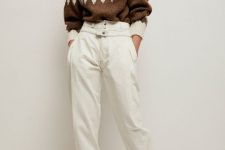 a retro-inspired turtleneck sweater, white high waisted jeans, brown boots for a cozy monochromatic look