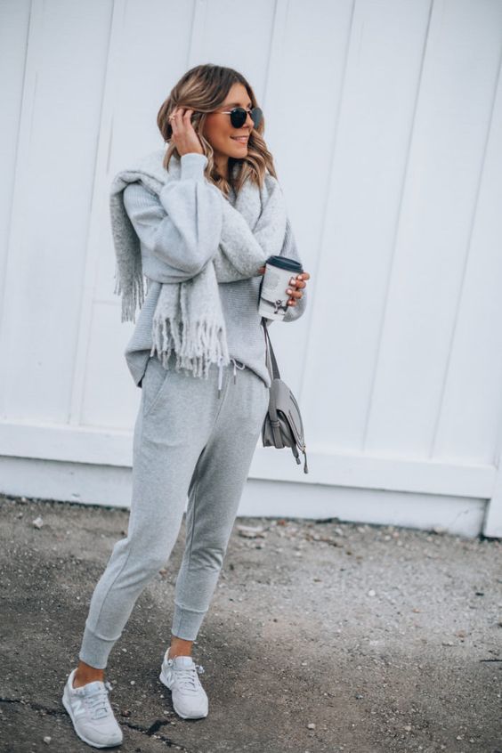 a sweater, joggers, grey trainers, a scarf and a crossbody bag for a simple and casual everyday look