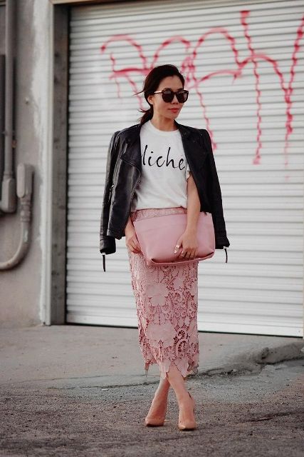 With t-shirt, black leather jacket, beige pumps and pale pink bag