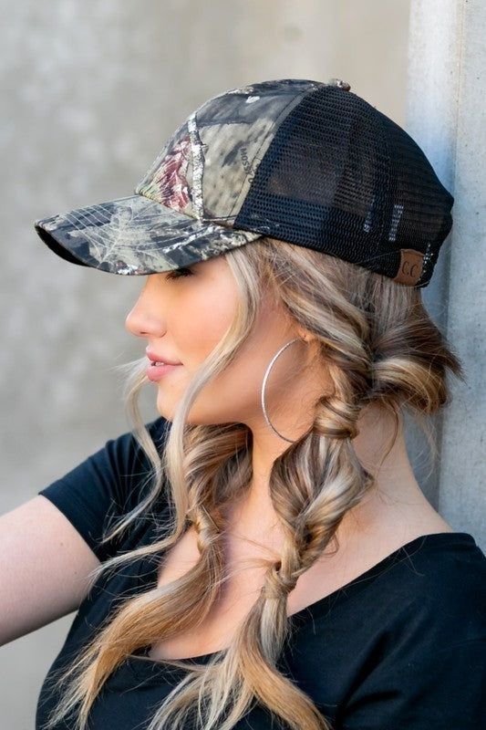 a cap paired with messy braids with knots and waves down are a lovely combo if you wanna look cute