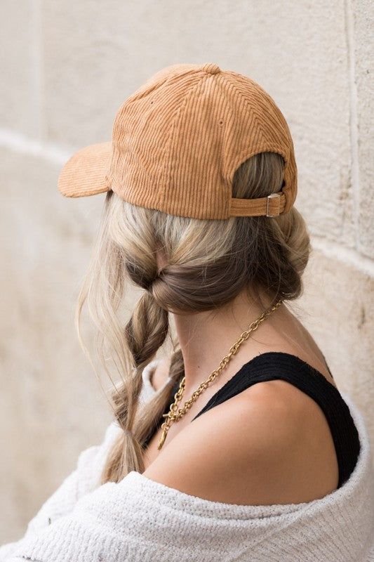 two simple bubble braids and a corduroy cap on top are a cool and cute idea for the fall