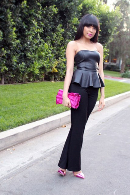 With black flare trousers, pink clutch and pink shoes