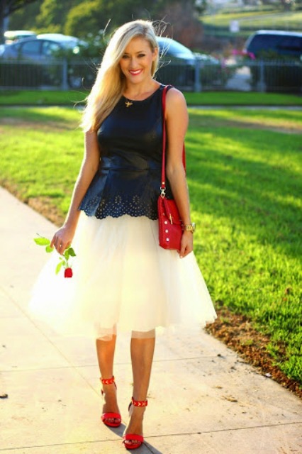 With white tulle skirt, red bag and red sandals
