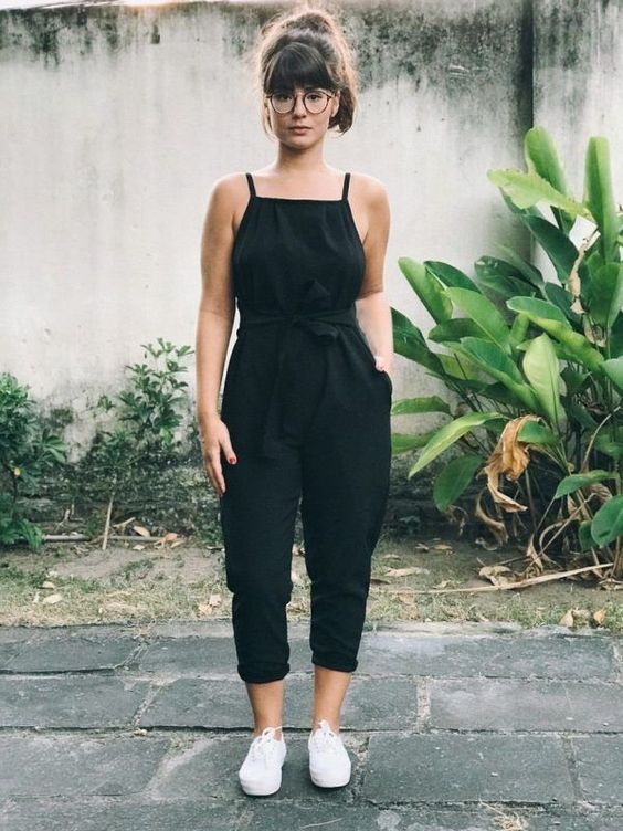 a black jumpsuit with spaghetti straps, pockets, white platform sneakers for spring to summer or summer days