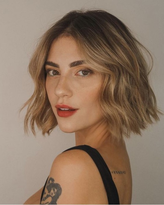 a relaxed bronde warm-shaded midi bob with waves and a darker root is a catchy and cool idea