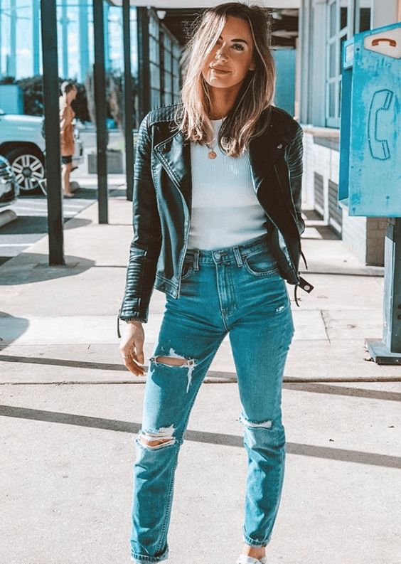 a white top, blue ripped boyfriends, a black moto jacket and white sneakers for every day