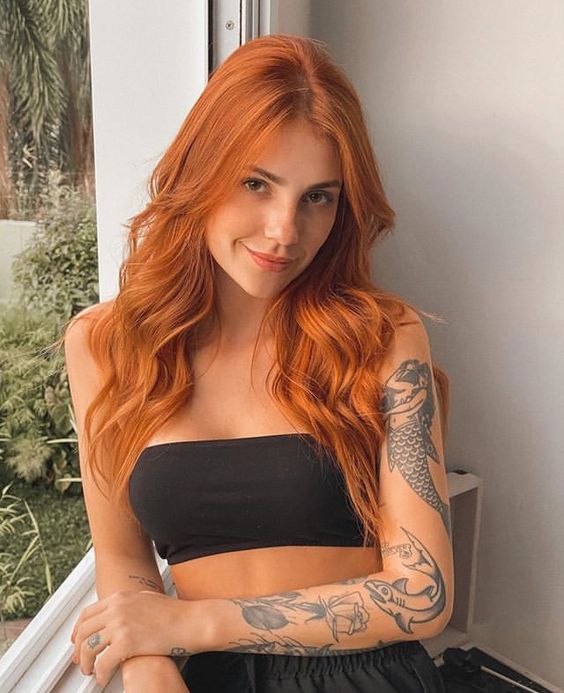 beautiful long ginger waves are an amazing way to stand out and look super bold and cool