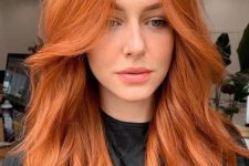 beautiful medium-length voluminous ginger hair with layers looks very fresh, modern and up-to-date