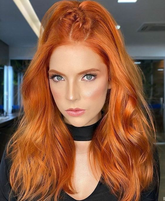 long and bright ginger hair with a lot of waves and a high ponytail plus some waves down is wow