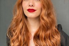 long ginger hair with a lot of volume and waves is a gorgeous solution, it looks fantastic, especially with a red lipstick