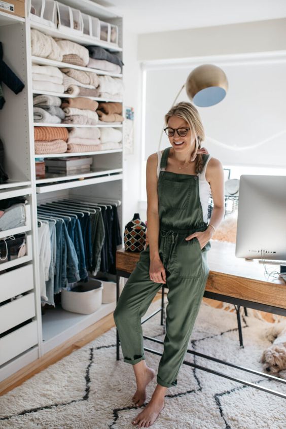 a white top, a green jumpsuit for working from home and feeling comfort