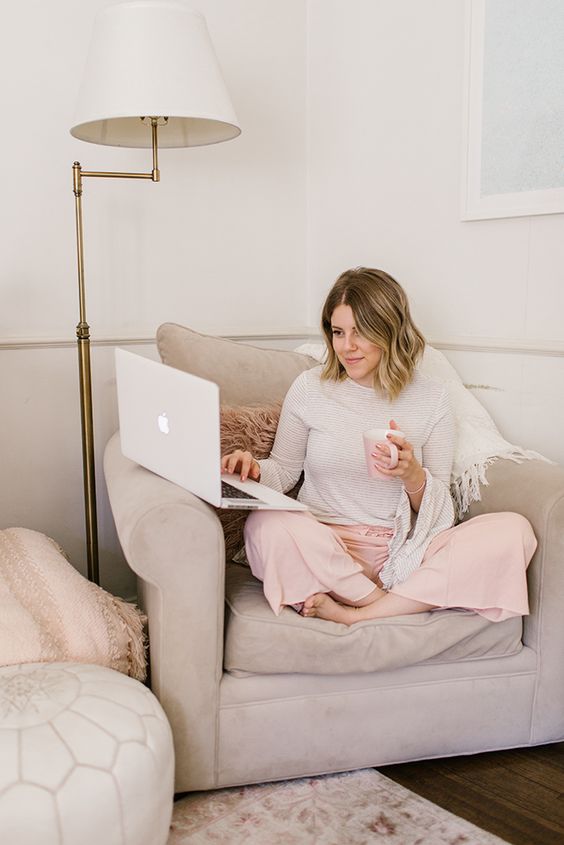 a simple striped top with bell sleeves and blush loungewear pants for working and having video calls