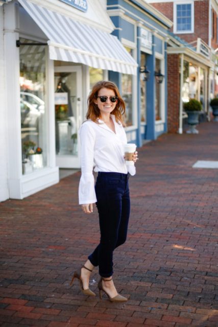 With navy blue jeans and brown ankle strap high heels