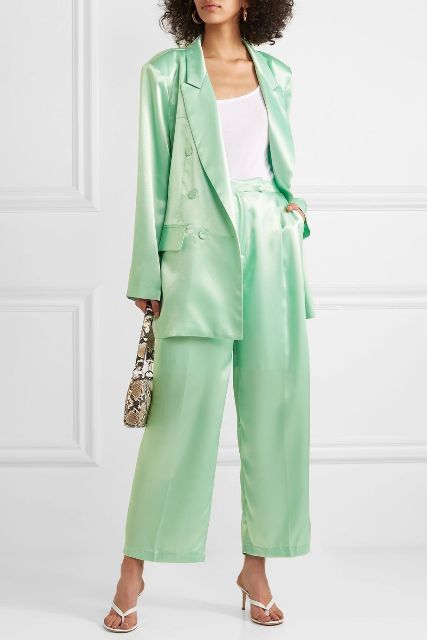 With white top, mint green satin long blazer, snake printed mini bag and white heeled sandals