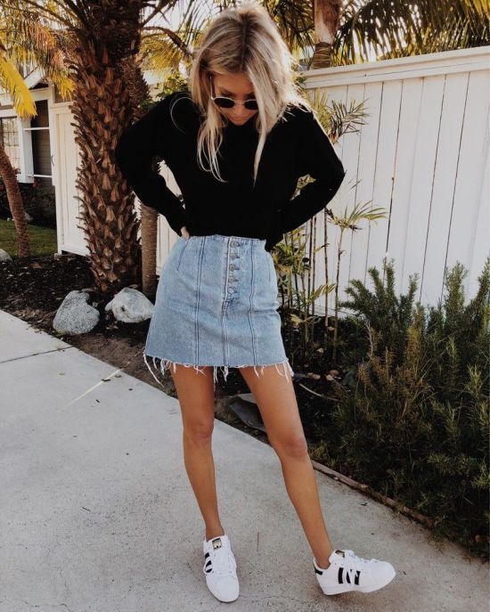 a black long sleeve top, a light blue mini button up skirt, white sneakers for a spring to summer look