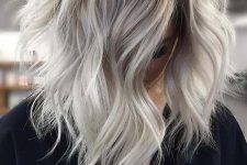 a long wavy volumetric bob done in silver blonde looks fantastic and catches an eye for sure